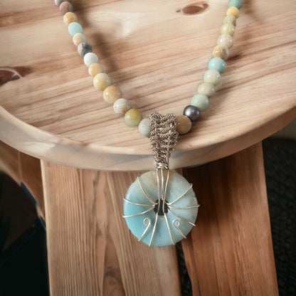 Silver wire wrapped Labradorite pendant and labradorite bead necklace.