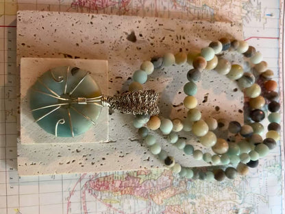 Silver wire wrapped Labradorite pendant and labradorite bead necklace.